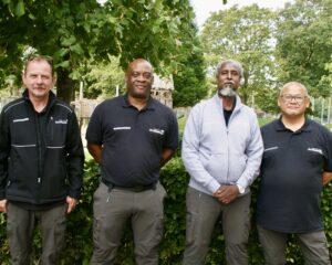 De buurtconciërges van Malburgen, Rijk van Veenendaal, Berwick Zinhagel, Eduard Marcus en Abdirisak Jimale.